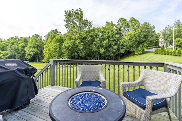 320 Manitoba Ln, Lexington, KY 40515 - wooden deck with area for grilling, a fire pit, and a lawn