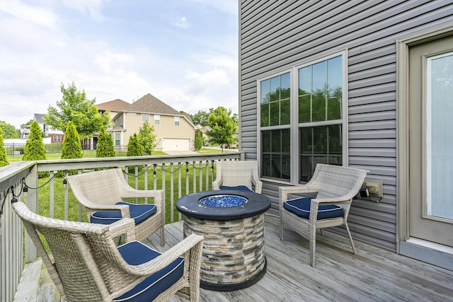320 Manitoba Ln, Lexington, KY 40515 - wooden terrace with an outdoor fire pit, a lawn, and a residential view