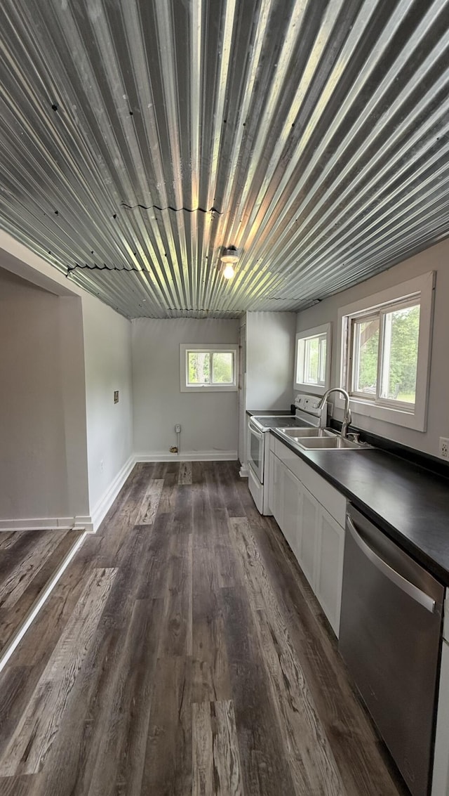 606 Prospect St, Berea, KY 40403 - kitchen featuring dishwasher, dark countertops, white cabinetry, dark wood-style flooring, and a sink