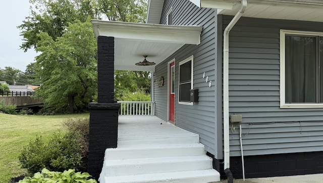606 Prospect St, Berea, KY 40403 - property entrance with covered porch and a lawn