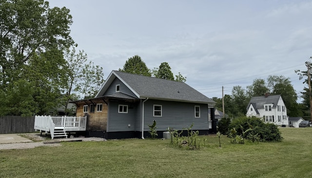 606 Prospect St, Berea, KY 40403 - rear view of house featuring a wooden deck and roof with shingles