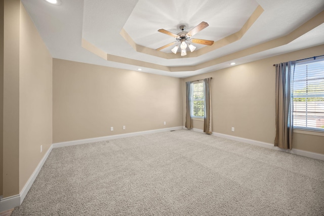 262 Silver Creek Dr, Somerset, KY 42503 - carpeted spare room with a raised ceiling, a ceiling fan, baseboards, and recessed lighting