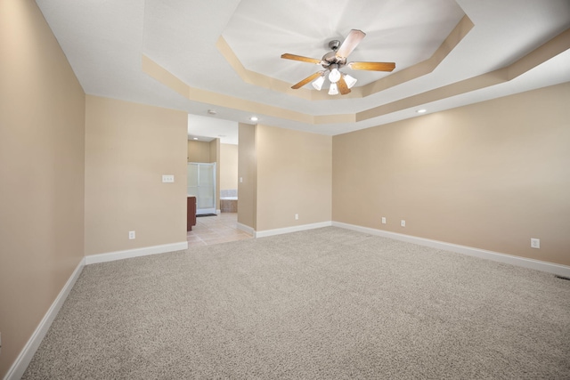 262 Silver Creek Dr, Somerset, KY 42503 - spare room with a raised ceiling, a ceiling fan, light carpet, recessed lighting, and baseboards