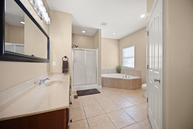 262 Silver Creek Dr, Somerset, KY 42503 - full bath featuring vanity, tile patterned flooring, a bath, toilet, and a stall shower