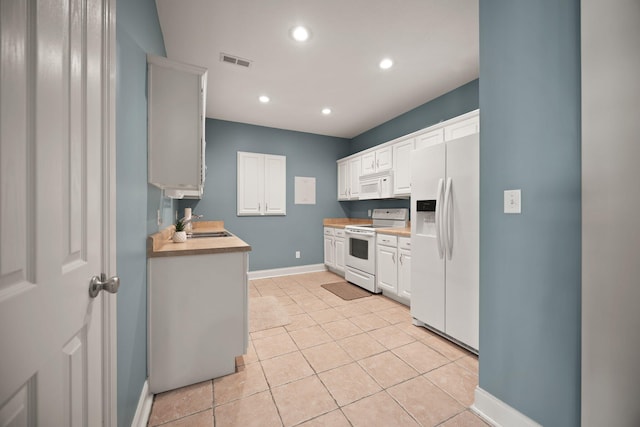 262 Silver Creek Dr, Somerset, KY 42503 - kitchen with white appliances, baseboards, white cabinets, recessed lighting, and light countertops