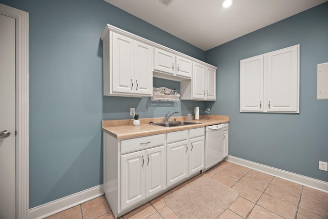 262 Silver Creek Dr, Somerset, KY 42503 - kitchen with white dishwasher, a sink, baseboards, and light countertops