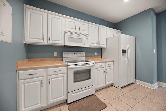 262 Silver Creek Dr, Somerset, KY 42503 - kitchen featuring white appliances, light countertops, and white cabinets