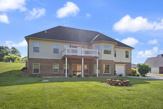 262 Silver Creek Dr, Somerset, KY 42503 - rear view of house with brick siding, a garage, and a lawn