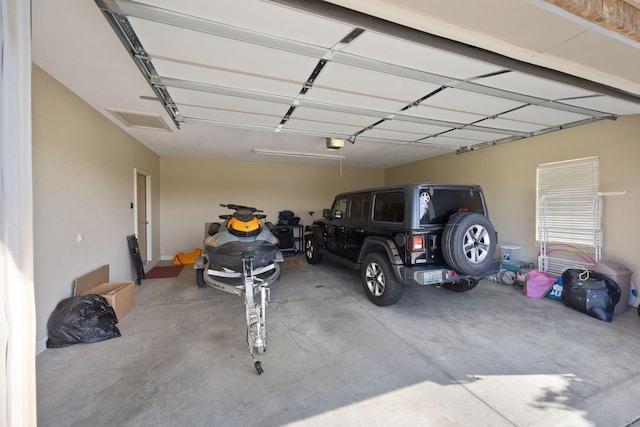 262 Silver Creek Dr, Somerset, KY 42503 - garage featuring a garage door opener
