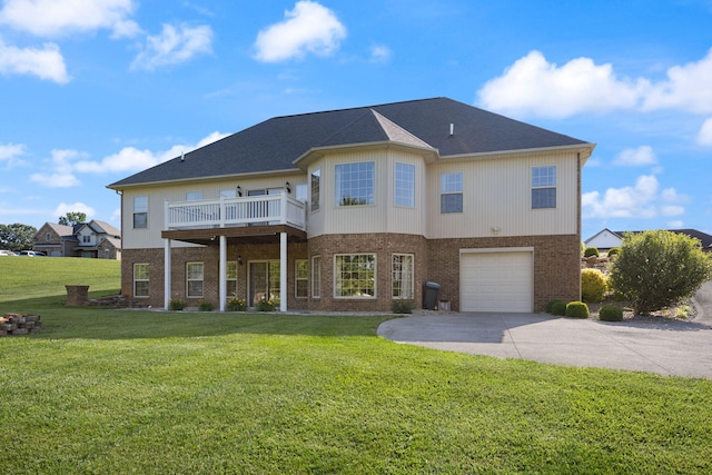 262 Silver Creek Dr, Somerset, KY 42503 - rear view of property with brick siding, concrete driveway, an attached garage, and a yard
