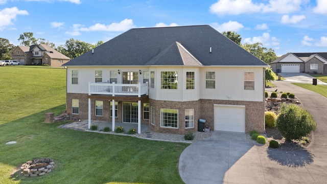 262 Silver Creek Dr, Somerset, KY 42503 - view of front of house featuring brick siding, concrete driveway, a front lawn, and an attached garage