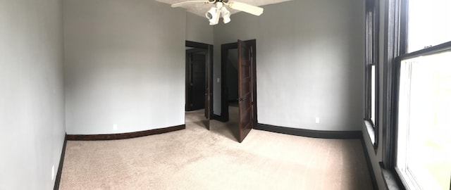 210 E 7th St, Lexington, KY 40508 - carpeted empty room featuring a ceiling fan and baseboards