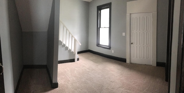 210 E 7th St, Lexington, KY 40508 - entrance foyer with carpet, baseboards, and stairs