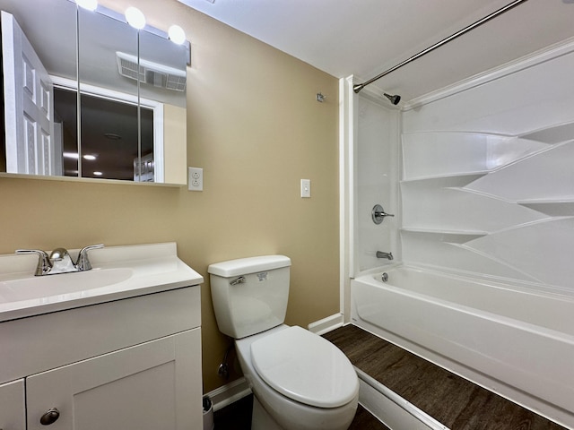 110 Witt Rd, London, KY 40741 - full bath with baseboards, vanity, bathtub / shower combination, toilet, and wood finished floors
