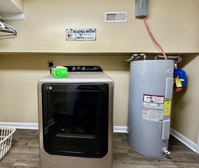 110 Witt Rd, London, KY 40741 - laundry area featuring electric water heater, wood finished floors, independent washer and dryer, and baseboards