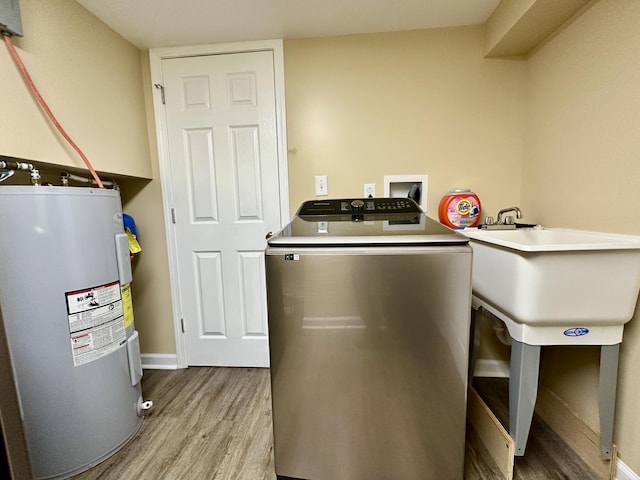 110 Witt Rd, London, KY 40741 - kitchen with water heater, wood finished floors, and baseboards