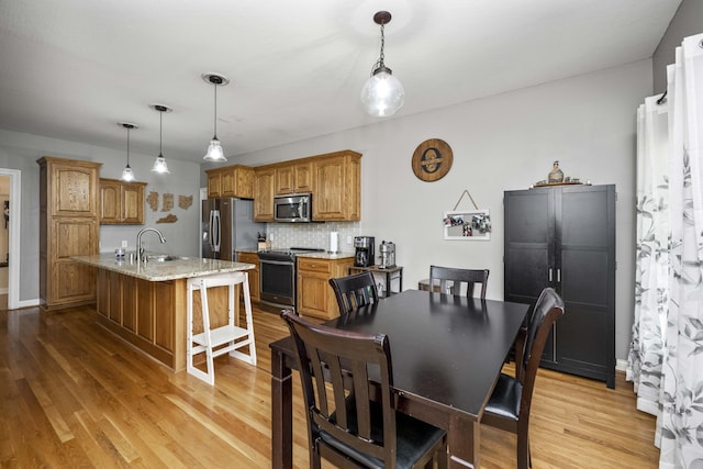 164 River Run Dr, Lancaster, KY 40444 - dining room featuring light wood-style floors and baseboards
