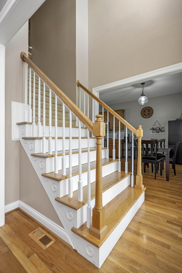 164 River Run Dr, Lancaster, KY 40444 - staircase featuring wood finished floors and baseboards