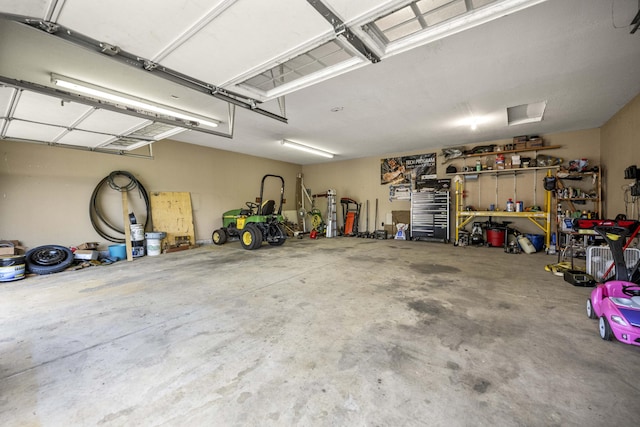164 River Run Dr, Lancaster, KY 40444 - garage with a workshop area