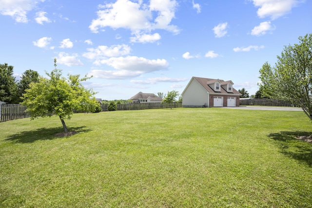 164 River Run Dr, Lancaster, KY 40444 - view of yard featuring asphalt driveway and a garage
