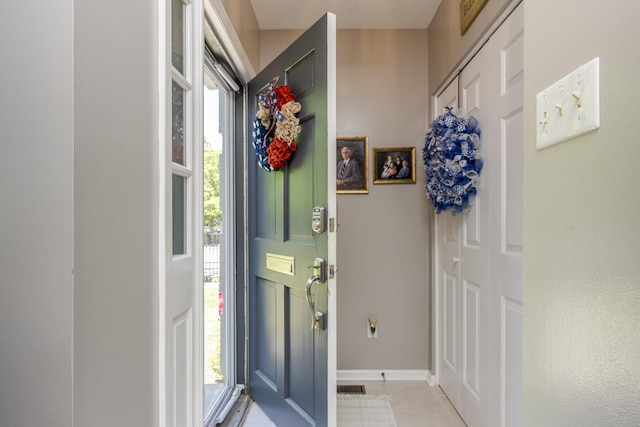 395 Redding Rd Unit 19, Lexington, KY 40517 - entrance foyer featuring plenty of natural light, light tile patterned floors, and baseboards