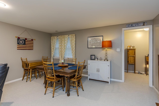 395 Redding Rd Unit 19, Lexington, KY 40517 - dining area featuring light colored carpet and baseboards