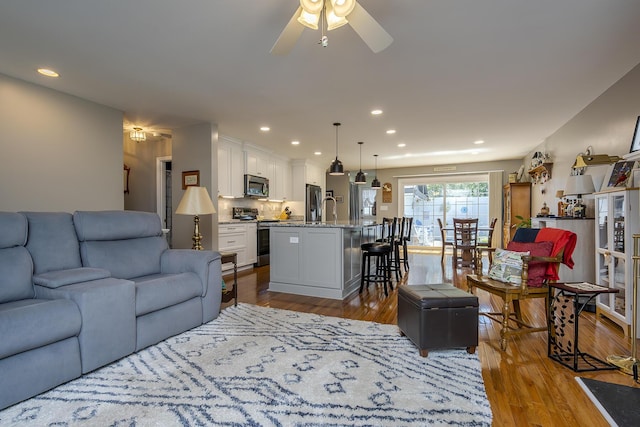 395 Redding Rd Unit 19, Lexington, KY 40517 - living room featuring wood finished floors, ceiling fan, and recessed lighting