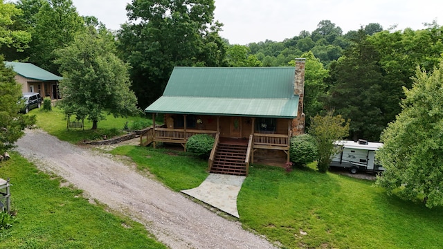 5080 Dry Branch Rd, Lexington, KY 40515 - view of front of home featuring covered porch, a chimney, driveway, and a front lawn