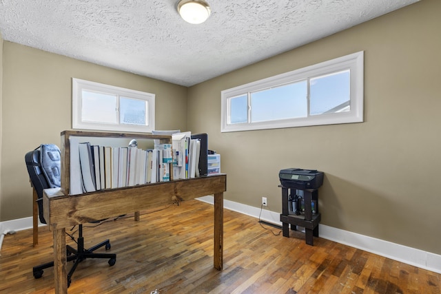 112 Gano Ave, Georgetown, KY 40324 - home office with hardwood / wood-style flooring, baseboards, and a textured ceiling