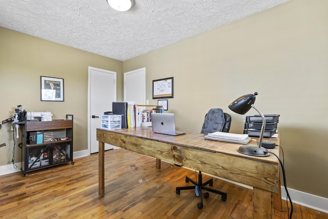 112 Gano Ave, Georgetown, KY 40324 - office with wood finished floors, baseboards, and a textured ceiling