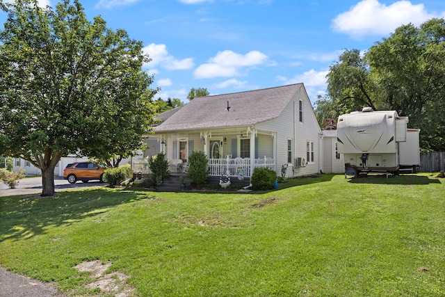 81 Coffey Ave, Jamestown, KY 42629 - view of front of house featuring a porch, a front lawn, and cooling unit