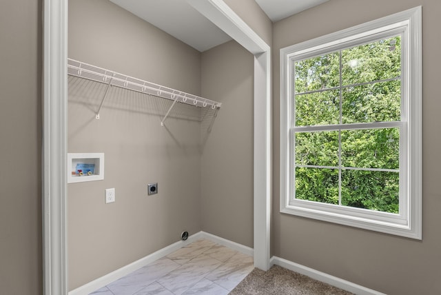 306 Young St, Georgetown, KY 40324 - laundry area featuring electric dryer hookup, washer hookup, light marble finish flooring, and baseboards