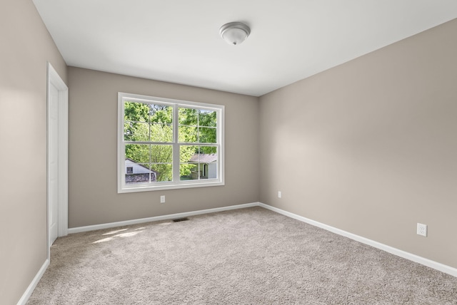 306 Young St, Georgetown, KY 40324 - carpeted empty room with baseboards