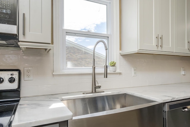 113 Jonathan Dr, Richmond, KY 40475 - kitchen with dishwasher, tasteful backsplash, white cabinetry, a sink, and light stone countertops