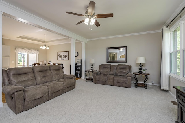 2018 E Ct, Richmond, KY 40475 - carpeted living room featuring ornamental molding, plenty of natural light, a chandelier, and a ceiling fan