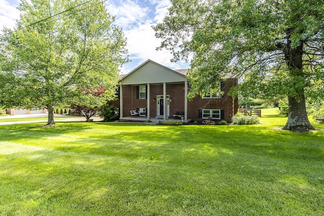 2018 E Ct, Richmond, KY 40475 - view of front of property featuring brick siding, a front lawn, and covered porch