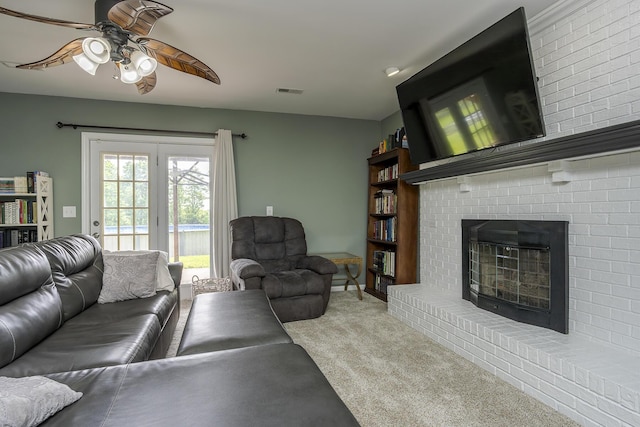2018 E Ct, Richmond, KY 40475 - living area featuring a ceiling fan, carpet flooring, and a brick fireplace