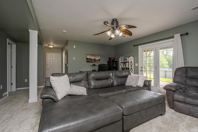 2018 E Ct, Richmond, KY 40475 - carpeted living area featuring ceiling fan, baseboards, and ornate columns