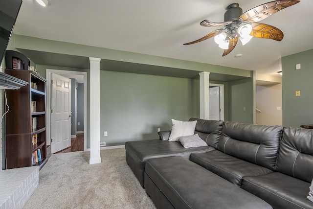 2018 E Ct, Richmond, KY 40475 - carpeted living area with decorative columns, a ceiling fan, and baseboards