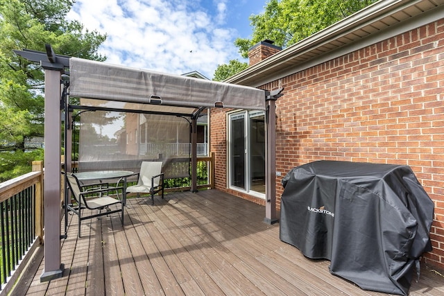 2018 E Ct, Richmond, KY 40475 - wooden terrace with outdoor dining area and a grill