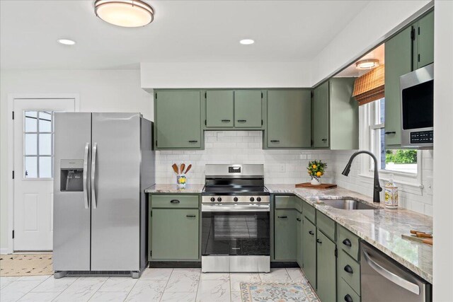 161 Toronto Rd, Lexington, KY 40515 - kitchen with stainless steel appliances, green cabinetry, a sink, and recessed lighting
