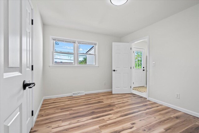 161 Toronto Rd, Lexington, KY 40515 - spare room featuring healthy amount of natural light, baseboards, and light wood finished floors