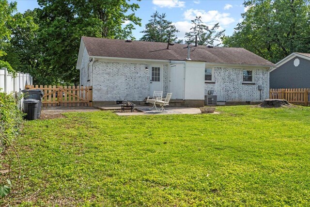 161 Toronto Rd, Lexington, KY 40515 - rear view of house featuring a patio area, brick siding, and crawl space