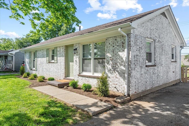 161 Toronto Rd, Lexington, KY 40515 - single story home with brick siding and a front yard