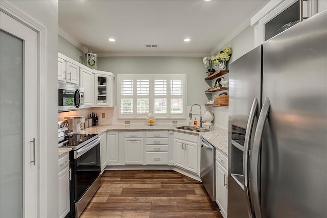 4172 Tradition Way, Lexington, KY 40509 - kitchen with stainless steel appliances, a sink, open shelves, crown molding, and white cabinetry