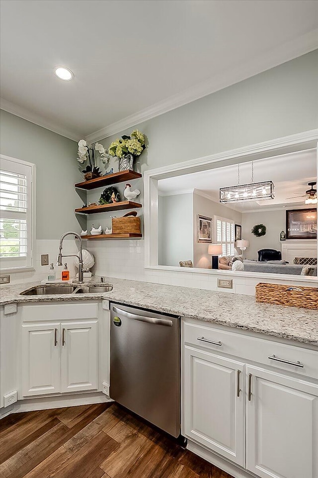 4172 Tradition Way, Lexington, KY 40509 - kitchen featuring stainless steel dishwasher, a sink, crown molding, dark wood-type flooring, and white cabinets