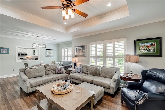 4172 Tradition Way, Lexington, KY 40509 - living room with a tray ceiling, ceiling fan, hardwood / wood-style flooring, crown molding, and baseboards