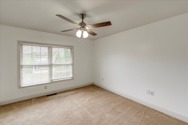 4172 Tradition Way, Lexington, KY 40509 - empty room featuring light colored carpet, baseboards, and ceiling fan