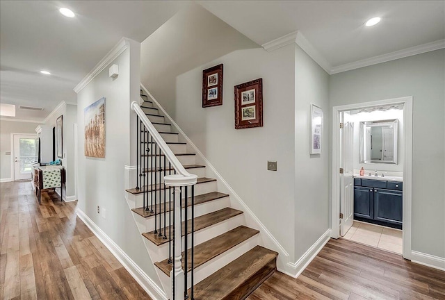 4172 Tradition Way, Lexington, KY 40509 - staircase featuring ornamental molding, wood finished floors, baseboards, and recessed lighting