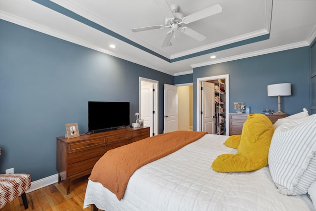 112 Woods Point Cir, Georgetown, KY 40324 - bedroom with wood finished floors, a raised ceiling, a closet, recessed lighting, and baseboards